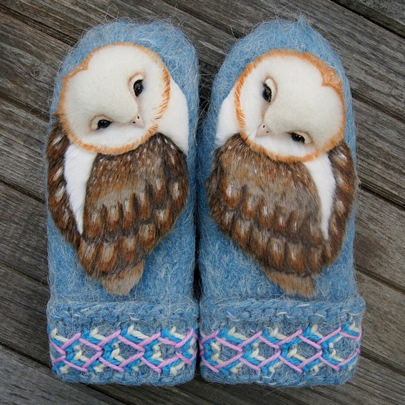 Handknitted Nordic gloves made of wool with owls