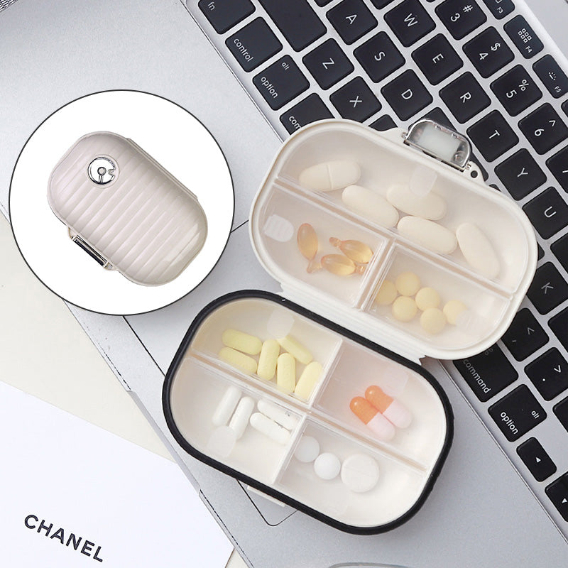 Portable daily pill box