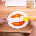 Oil-resistant cleaning scraper