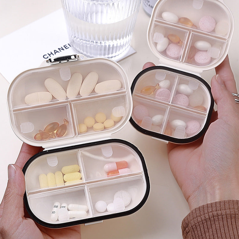 Portable daily pill box
