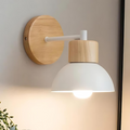 Stylish wall lamp made of wood for a harmonious home