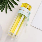 Double-walled glass bottle with tea strainer and infuser
