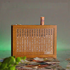 Wood savings box with engraved figures
