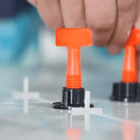 Reusable tile leveling system