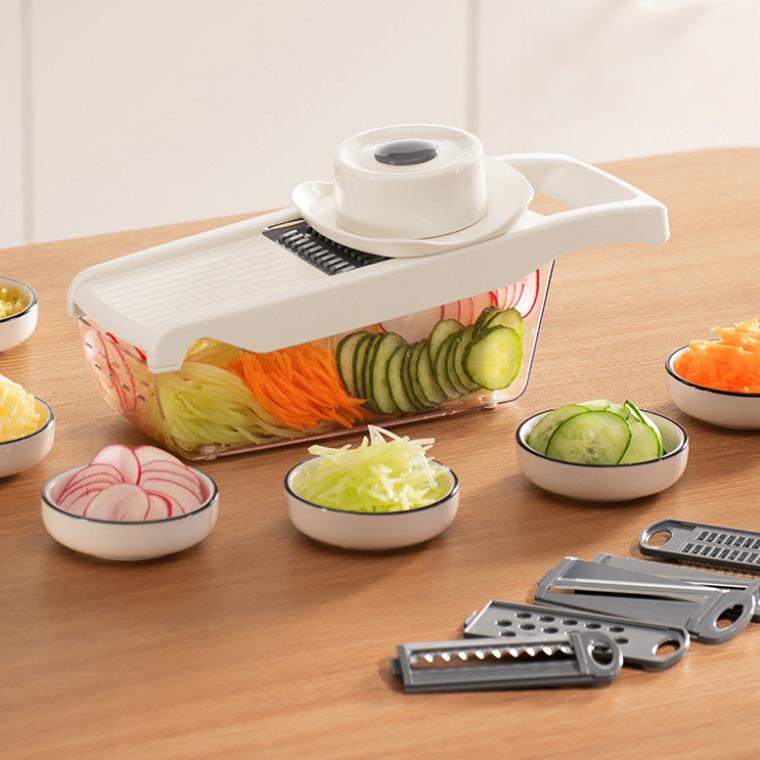 Multi-purpose vegetable grater/shredder for home use