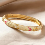 4pc Floral Accented Bangle Stack