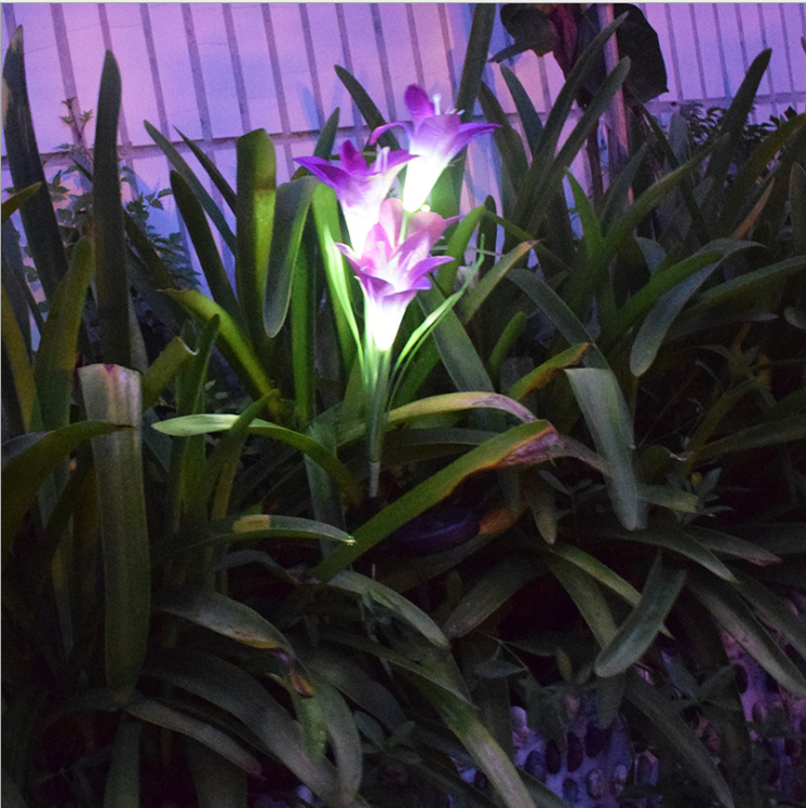 Solar LED flower lights in lily shape – Color-changing garden lights with stake for outdoor areas