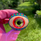 Tobacco pipe in eye shape