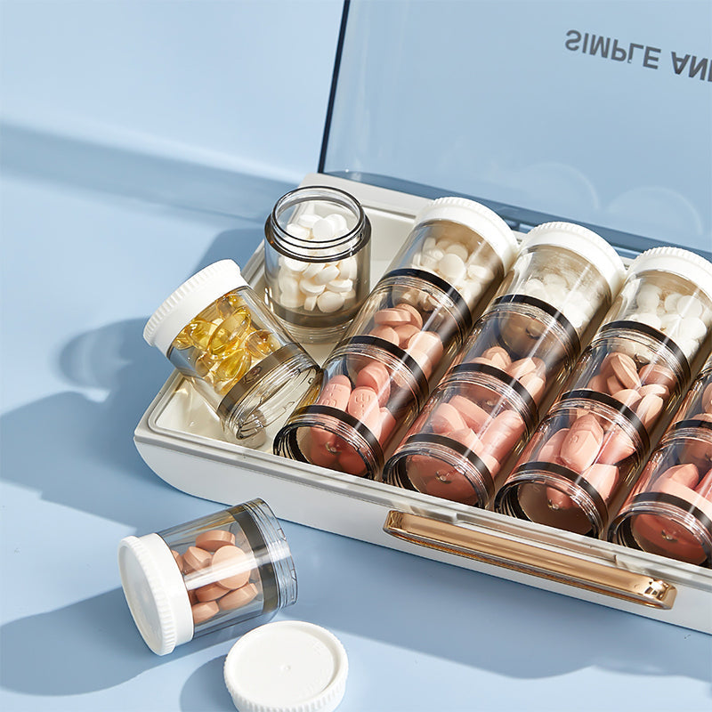 Portable high-capacity weekly pill box