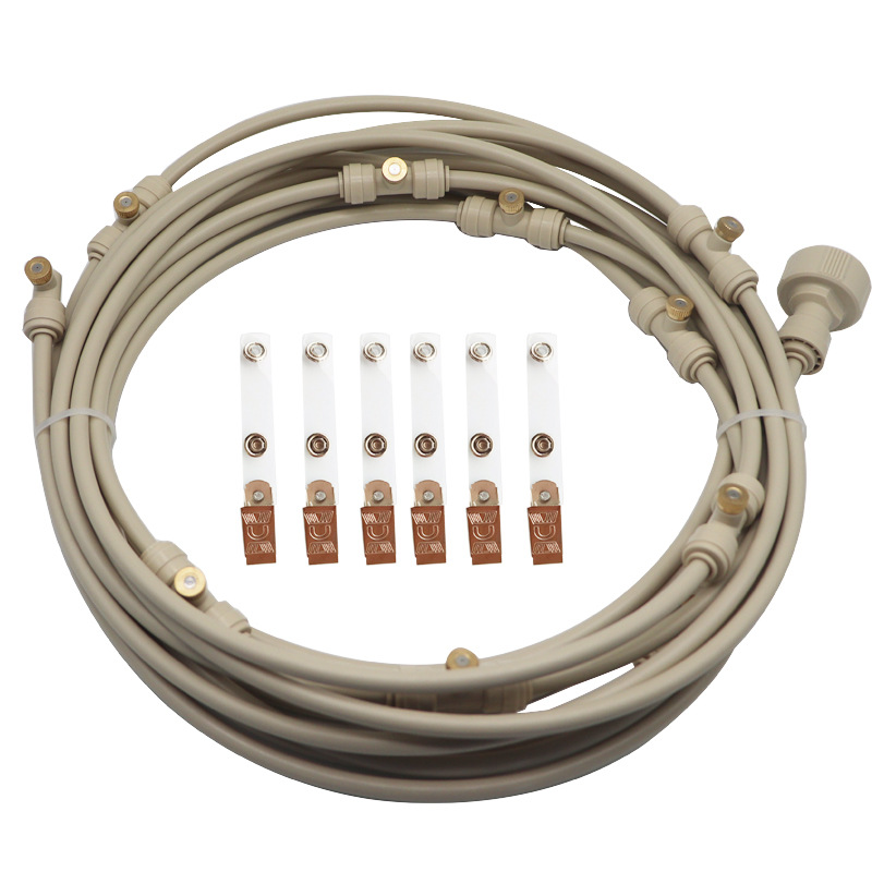Spray irrigation system – Water hose with spray nozzles for refreshing cooling in the garden