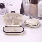 Portable daily pill box