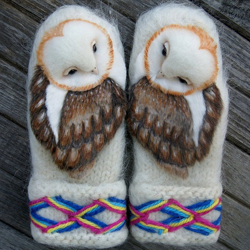 Handknitted Nordic gloves made of wool with owls