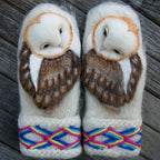 Handknitted Nordic gloves made of wool with owls