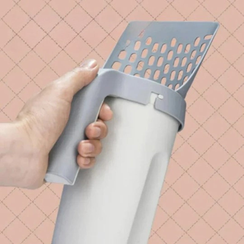 Self-cleaning cat litter box with integrated bag dispenser