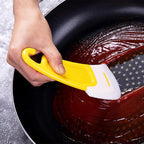 Oil-resistant cleaning scraper