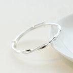 Elegant Twisted Silver Bracelet