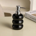 Ceramic dispenser with pump