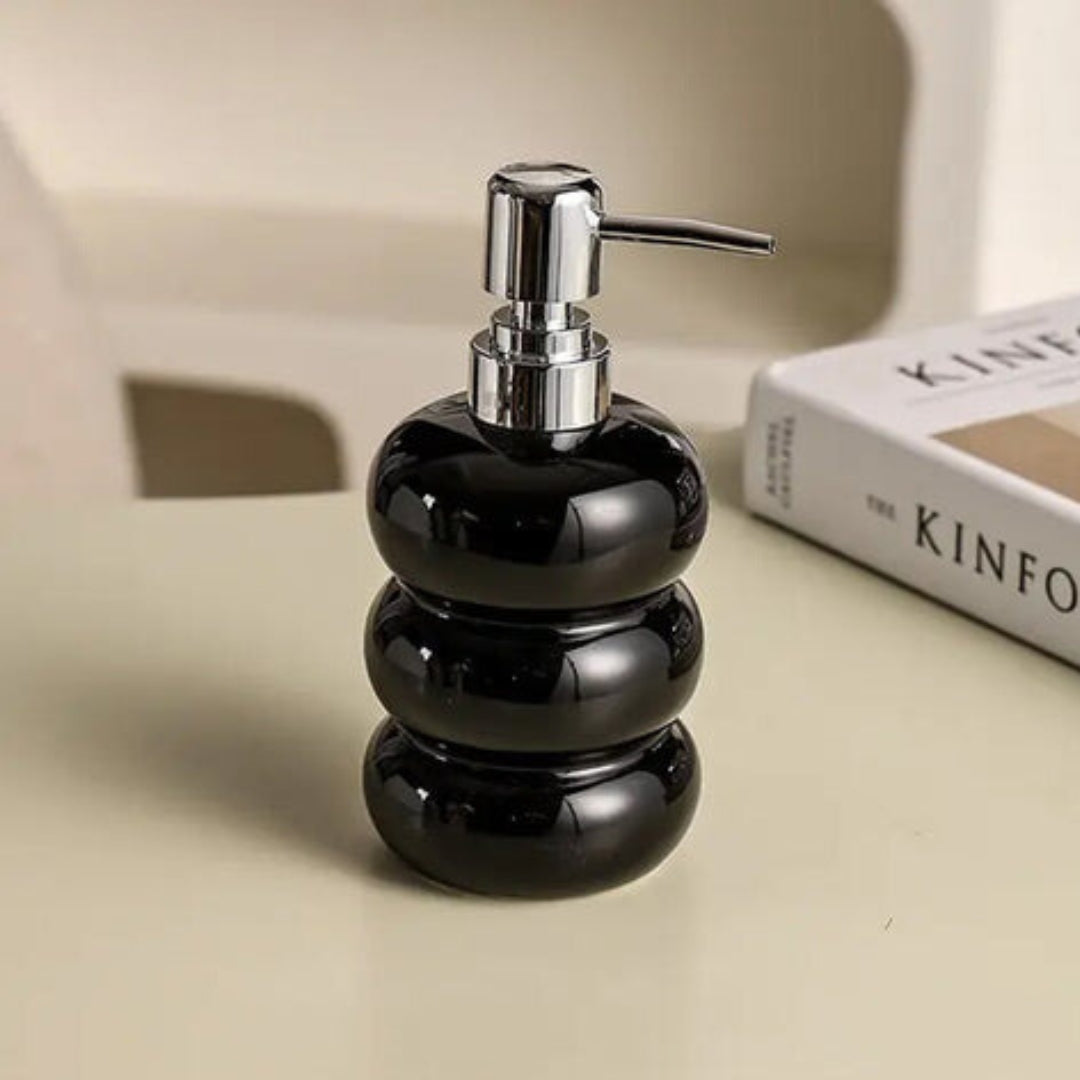 Ceramic dispenser with pump
