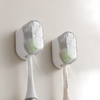 Wall-mounted toothbrush holder with cover