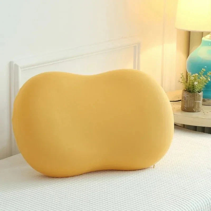 Ergonomic pillow with soft, colorful shape for comfort and relaxation