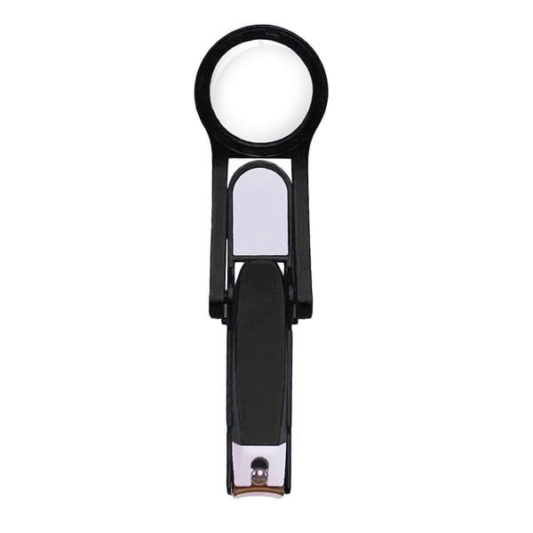 Nail clipper with magnifying glass