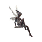 Statue of sitting fairy in the garden