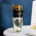 Double-walled glass bottle with tea strainer and infuser