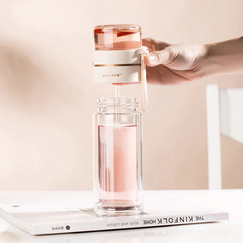 Double-walled glass bottle with tea strainer and infuser