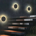 Minimalist LED wall light in round or square, IP65