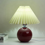 Nordic minimalist 1-light table lamp made of ceramic with pleats
