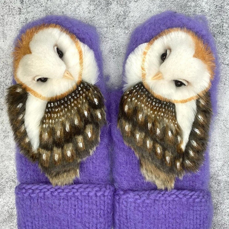 Handknitted Nordic gloves made of wool with owls