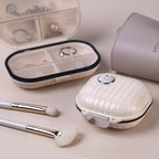 Portable daily pill box