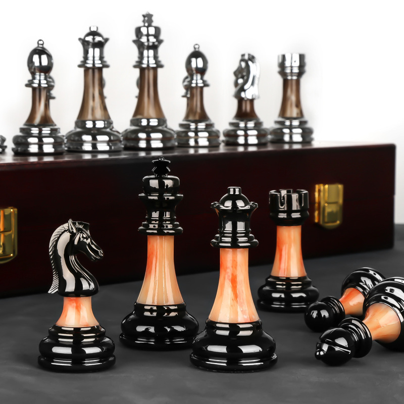 Luxurious chess set made of metal with a large 45 cm wooden board