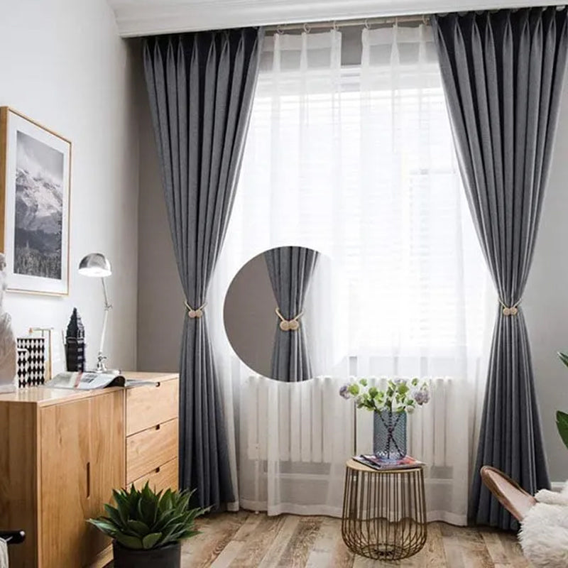 Curtain tiebacks with magnetic curtain clasp