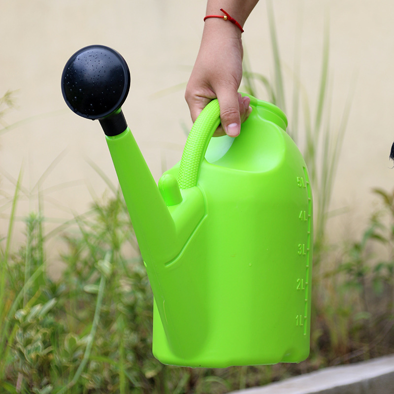 Watering can with large capacity and long spout for precise watering and plant care