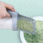 Self-cleaning cat litter box with integrated bag dispenser