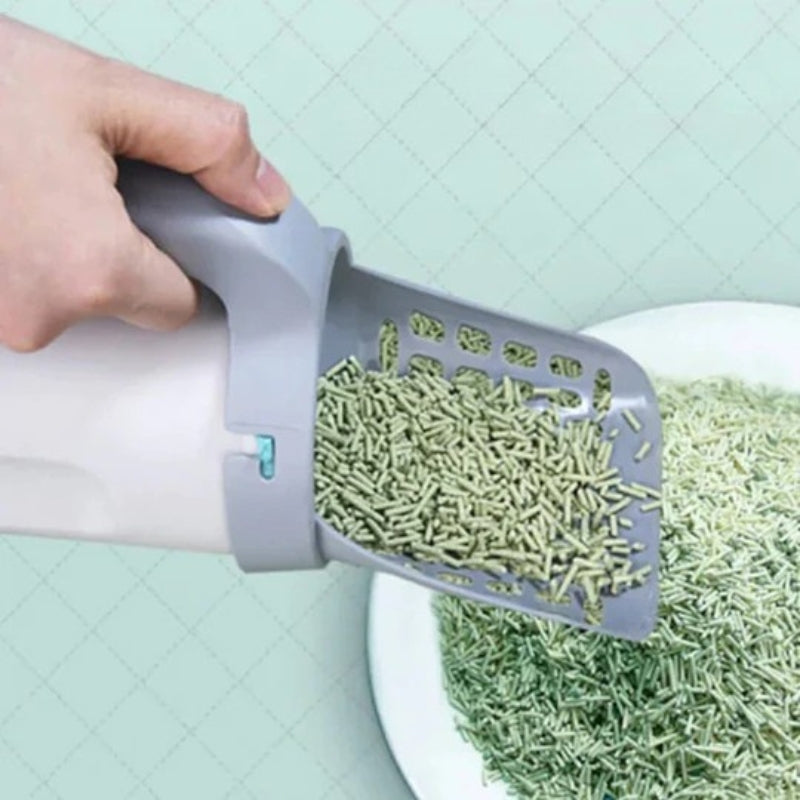 Self-cleaning cat litter box with integrated bag dispenser