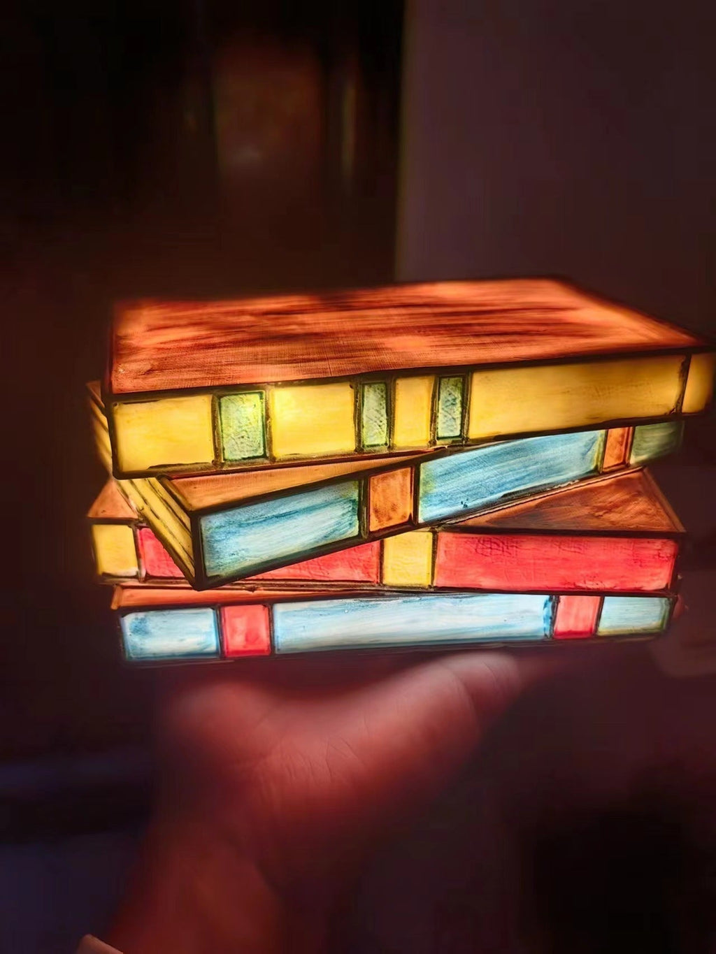 Desk lamp with stacked books