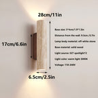 Travertine wall lamp in Japandi tube shape