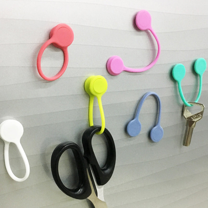 Useful magnetic cable storage holder
