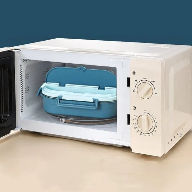 Thermo-Lunchbox made of stainless steel – inside made of stainless steel – 3 or 4 compartments with soup bowl – wall clock
