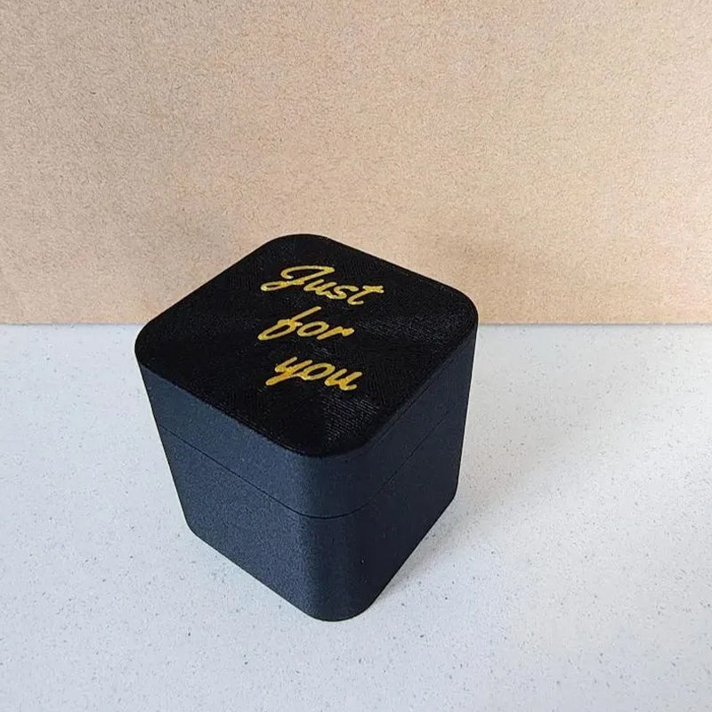 Middle finger in a box