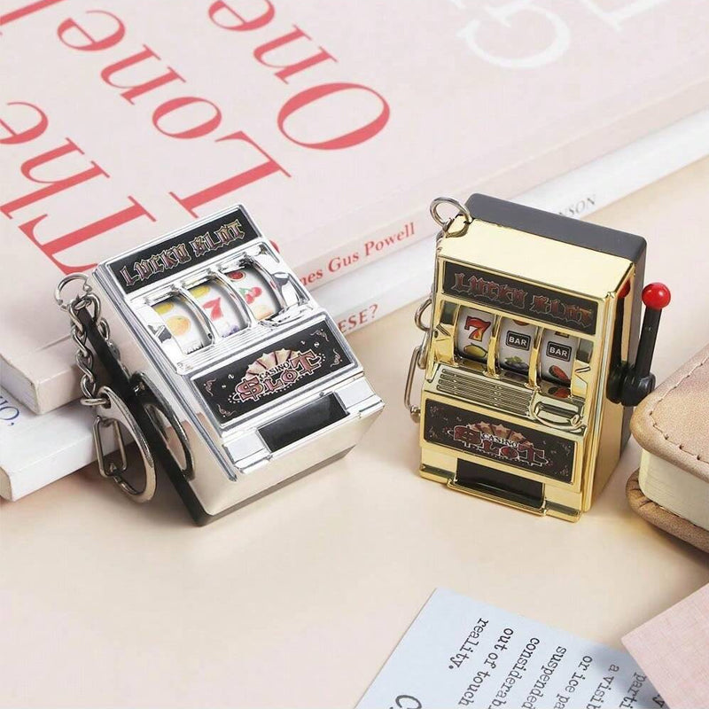 Keychain designed as a slot machine