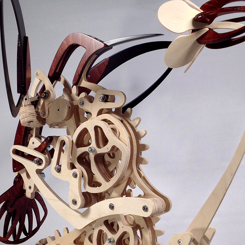 Wood kinetic hummingbird sculpture
