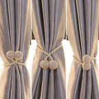 Curtain tiebacks with magnetic curtain clasp