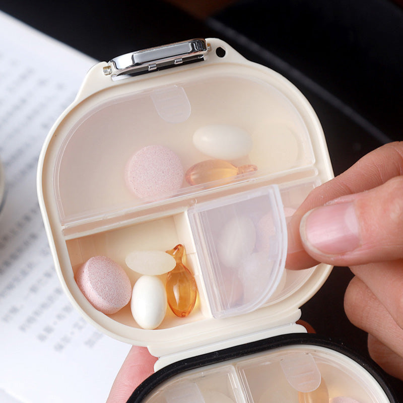 Portable daily pill box