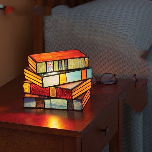 Desk lamp with stacked books