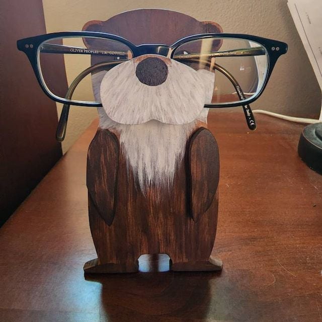 Wooden glasses stand with animals