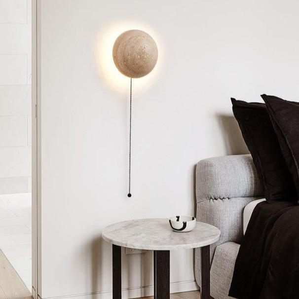 Cream wall lamp in Scandinavian style providing cozy light and elegant simplicity