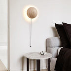 Cream wall lamp in Scandinavian style providing cozy light and elegant simplicity